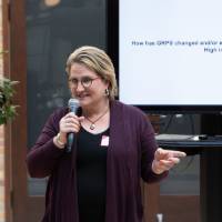 Woman speaking and smiling